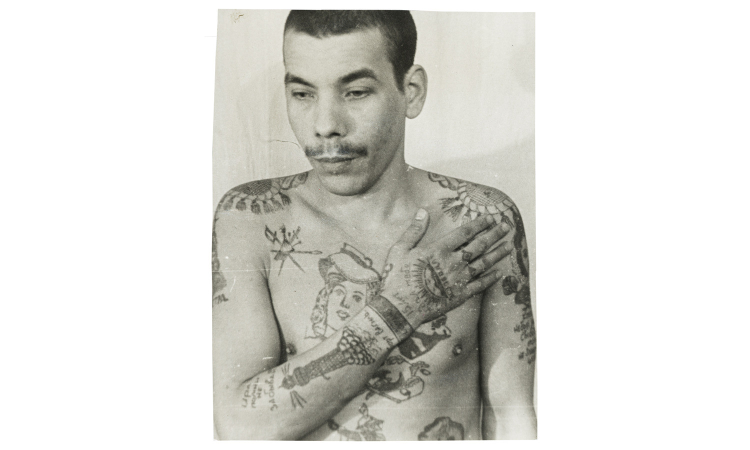 The Secret Meanings Behind Russian Prison Tattoos